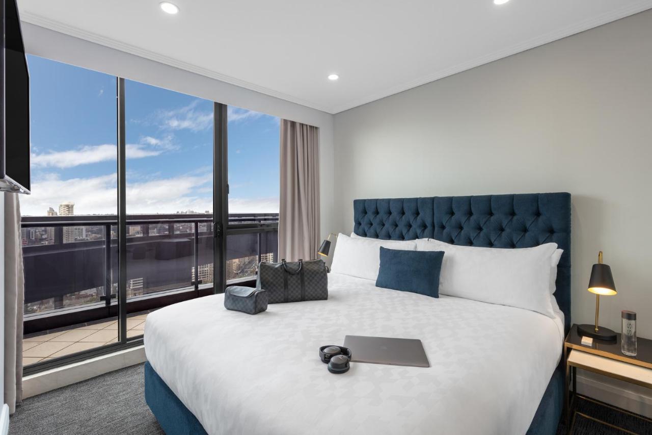 Meriton Suites Pitt Street, Sidney Dış mekan fotoğraf A bedroom at the hotel